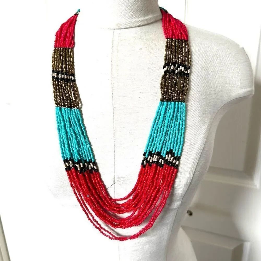 Long multi strand beaded statement necklace